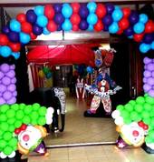 Playful Clowns Balloon Arch