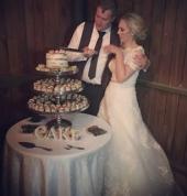 Naked carrot cake with 100 mini cakes decorated with fresh roses