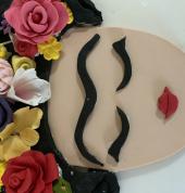 Red Velvet birthday cake with Frida Kahlo fondant picture